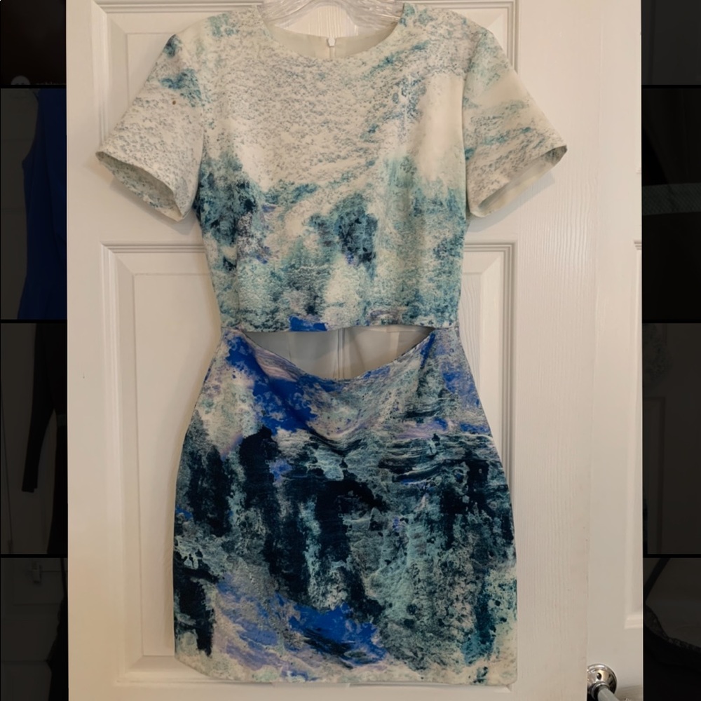 short sleeve dress with a cut out in front to show the stomach! Runs small